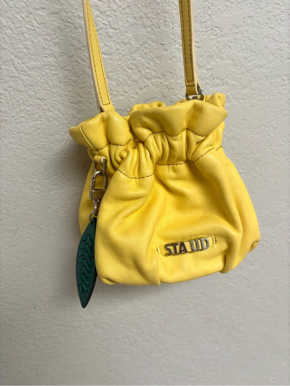 Staud / mini Grace leather crossbody bag in yellow